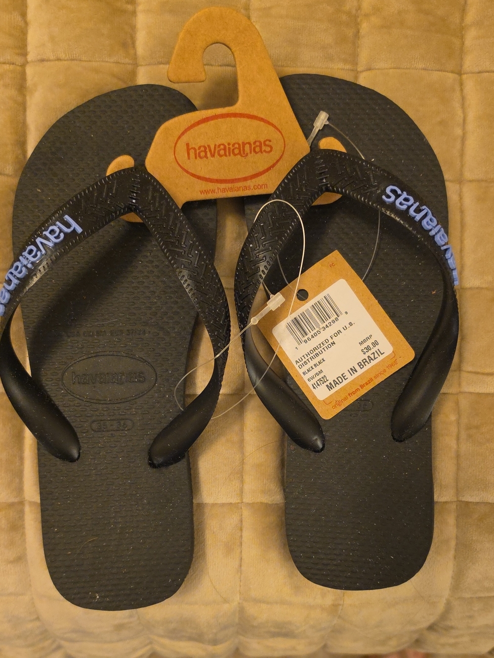 Havaianas Black Flip Flops with Blue Logo on Straps